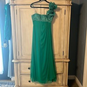 Green one shoulder gown